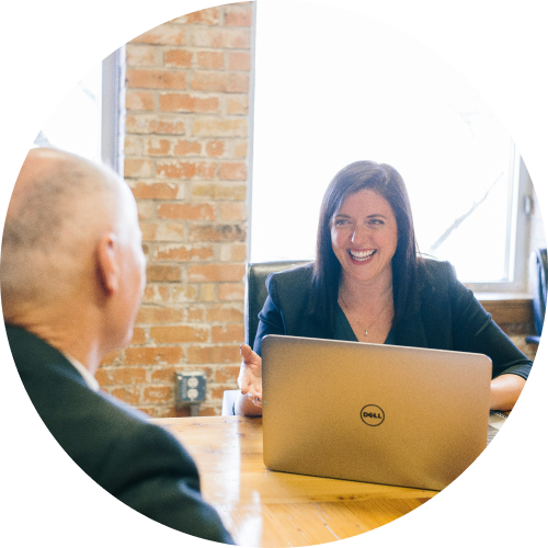 Therapist talking to a tenant and using Nebo to write Progress Notes